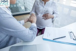 Expecting mother learning about early prenatal care, first appointment timing, and prenatal testing options including NIPT and DNA services at Face DNA